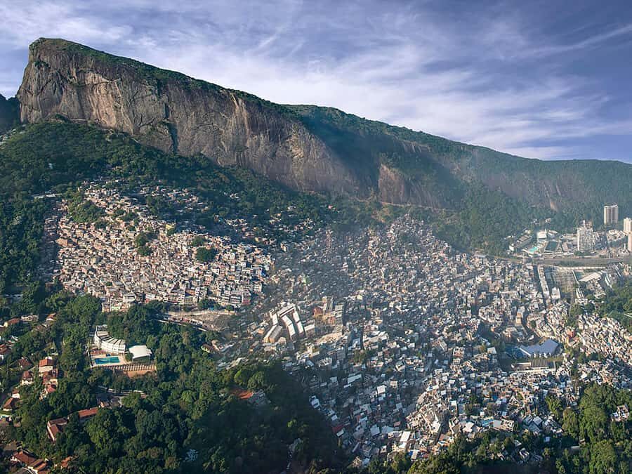 Discover Rocinha: Guided Tour of the Famous Favela - The motorbike climb (15 reis) and the walking descent through narrow lanes
