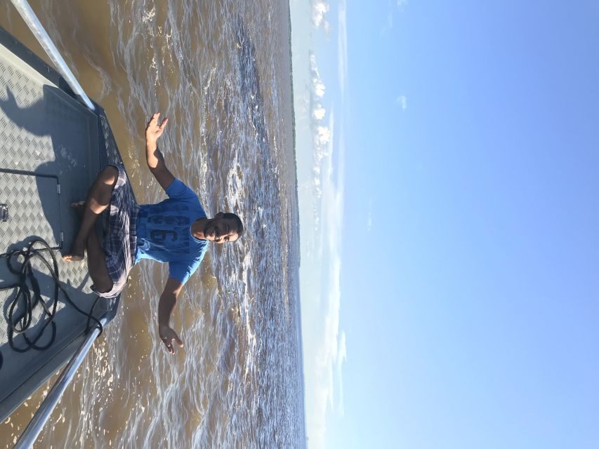From Manuas: Full-Day River Tour - The beach-and-lunch reset: white sand, then floating comfort