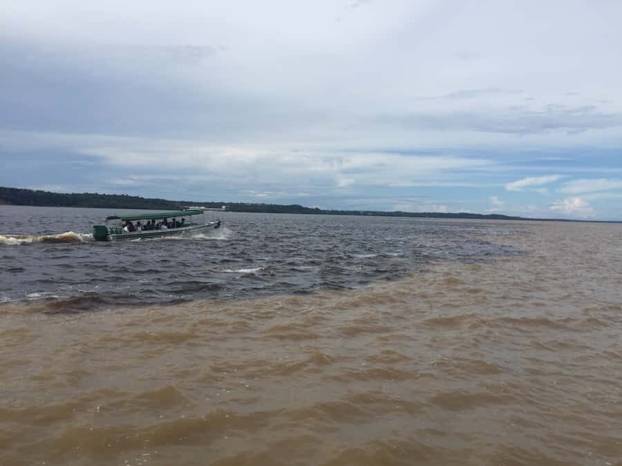 From Manuas: Full-Day River Tour - The meeting of rivers: side-by-side without mixing