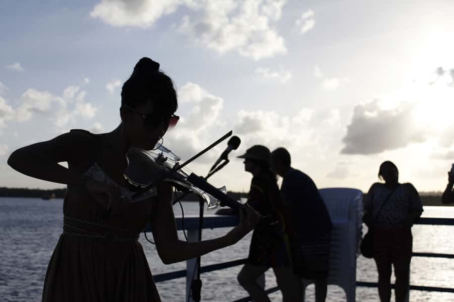 Jacare Beach Sunset Tour - Jurandy do Saxophone on the water: boat cruise, views, and a real concert moment