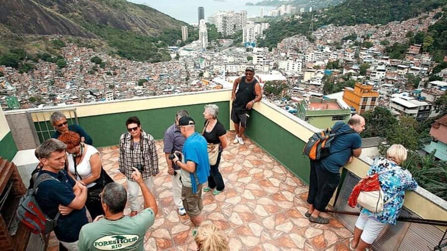 Rio: Favela Walking Tour of Rocinha with a Resident Guide - The Moto-Taxi Ride Up Rocinha: Views That Change the Scale
