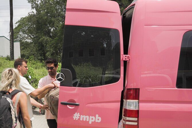 Shuttle from Puerto Viejo to San Jose - Pink Mercedes Sprinters: what the bus experience feels like
